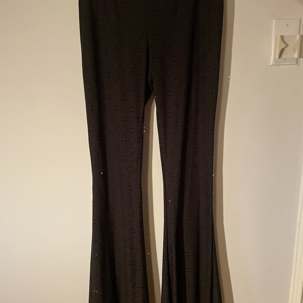 Pants. Boot cut. Eyelet cotton blend.